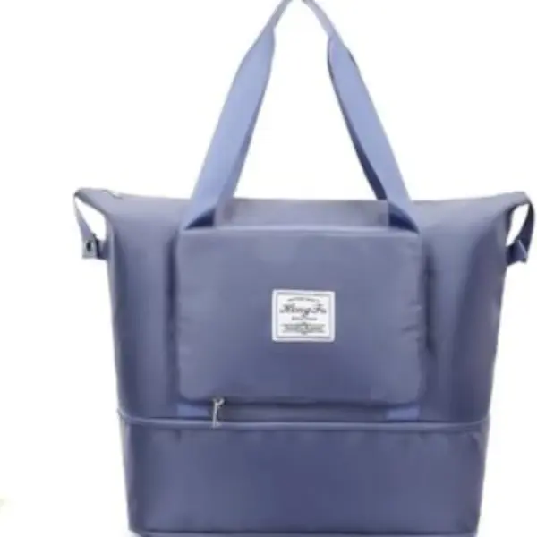 شنطة سفر رياضية محموله من القماش قابلة للطئ