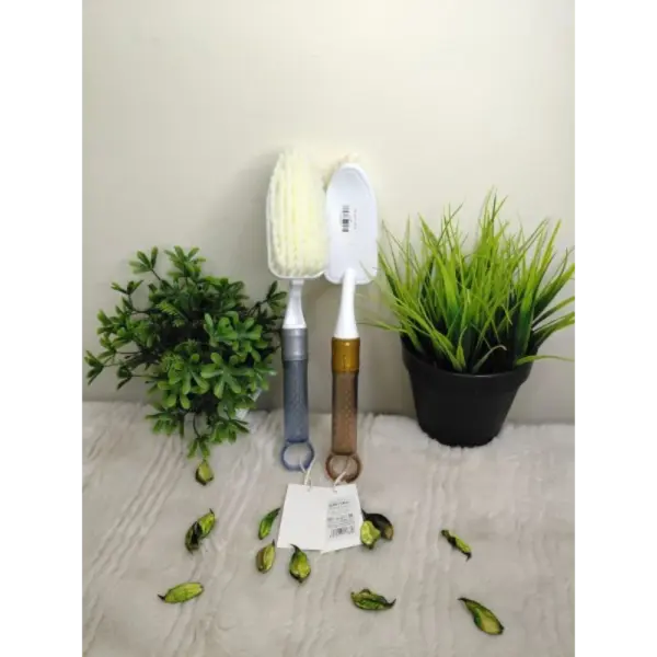 فرشاه ملابس بيد الوان